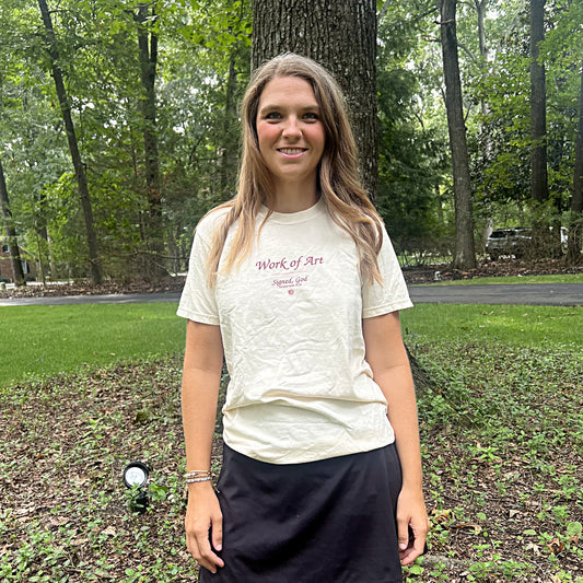 Woman wearing the Work of Art tee in Ivory